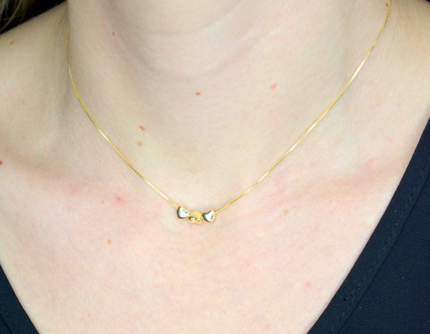 Naszyjnik damski srebrny pozłacany z trzema serduszkami Armonica Nomination 241305 006.png